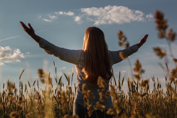 happy woman in field